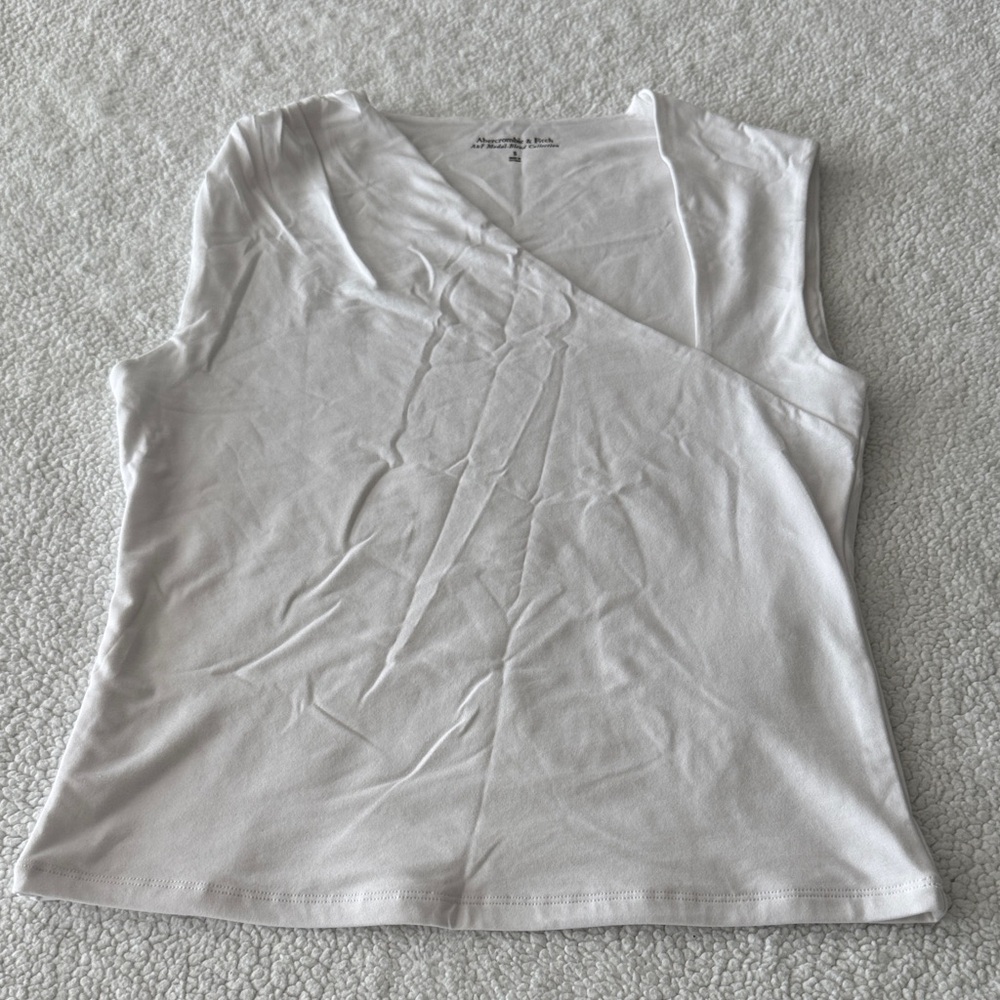White Sleeveless Asymetrical Top